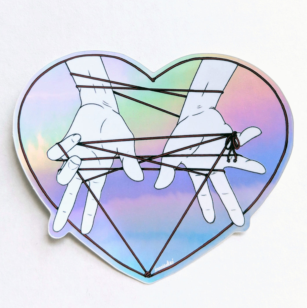 HOLOGRAPHIC STICKER – RED THREAD TOY